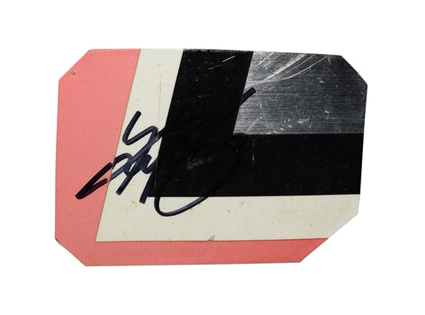 Detailed image of the 2008 Kyle Busch #18 M&M’s Racing race-used sheet metal, featuring a vibrant 3-color piece from the Daytona 500 car. This rare NASCAR collectible fits inside a plastic toploader for protection and display, with a COA included.