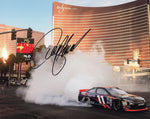 This stunning autographed photo of Denny Hamlin from 2010 captures the excitement of his Las Vegas Champions Week celebration, highlighting his skill behind the wheel. Measuring 8x10 inches, it includes a Certificate of Authenticity, making it a cherished keepsake for any racing fan or memorabilia collector.