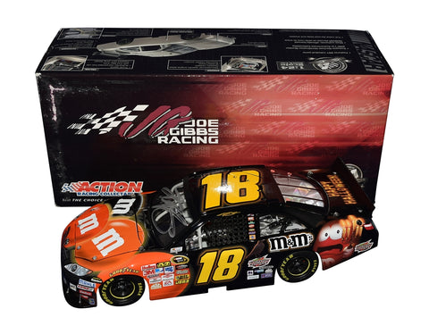 Celebrate NASCAR history with this signed 2010 Kyle Busch #18 M&M’s Halloween diecast car. Numbered #642 of 904, featuring Joe Gibbs Racing branding and an official COA, it’s a rare and exciting gift option for diecast collectors and racing fans.