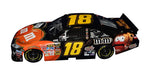 This autographed 2010 Kyle Busch #18 M&M’s Racing Halloween diecast by Lionel boasts detailed craftsmanship and authentic race logos. Numbered #642 of 904, this signed 1/24 scale NASCAR collectible makes a standout gift for fans and collectors alike.
