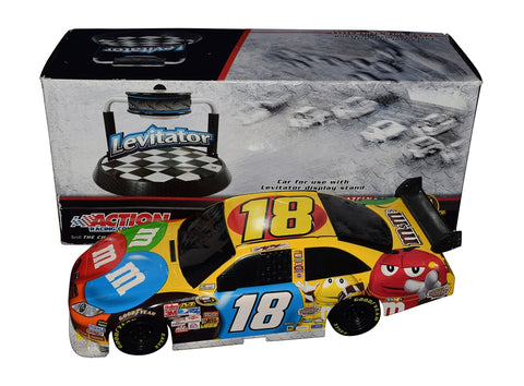 This autographed 2010 Kyle Busch #18 M&M’s Levitatior diecast car by Lionel features detailed racing decals and Joe Gibbs Toyota branding. Signed by Busch and including a COA, this 1/24 scale collectible is an exceptional gift for NASCAR enthusiasts and diecast collectors.