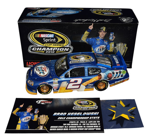 Autographed 2012 Brad Keselowski #2 Miller Lite Championship car diecast. A rare 1/24 scale model signed by the NASCAR champion and complete with confetti.