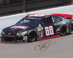 Autographed 2013 Dale Earnhardt Jr. #88 National Guard Superman "Soldier of Steel" photo from the Michigan race, featuring Dale Jr. in his Superman-themed car. COA included for authenticity.