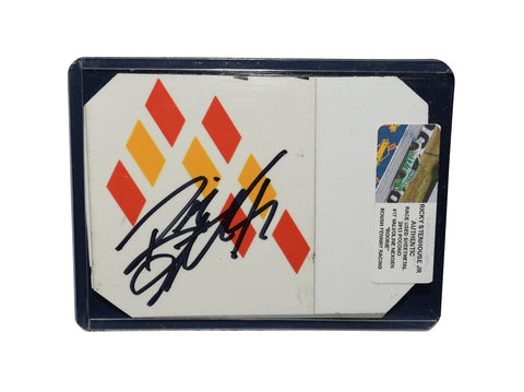 Autographed 2013 Ricky Stenhouse Jr. #17 Valvoline race-used sheet metal from Pocono, featuring a bold 3-color Roush logo. This trading card-sized collectible is signed by Stenhouse and encased in a protective toploader. A must-have NASCAR collectible and a perfect gift for racing fans.