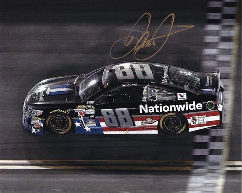Autographed 2015 Dale Earnhardt Jr. #88 National Guard Daytona Night Race photo, capturing Dale Jr. in his patriotic-themed car during the July 4th weekend race. COA included for authenticity.