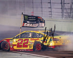 This signed 8x10 inch photo of Joey Logano celebrating his 2018 NASCAR Championship showcases his iconic burnout. Featuring the #22 Shell Pennzoil Racing car, it comes with a Certificate of Authenticity (COA).
