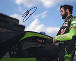 Autographed 2020 Chase Elliott #9 Mountain Dew Racing Michigan Race photo, showcasing Elliott in action during his impressive championship season. This 8x10 inch glossy print is an essential collectible for any NASCAR enthusiast, complete with a Certificate of Authenticity for genuine memorabilia.