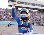 This autographed 2021 Kyle Larson #5 Hendrick Cars photo captures the thrilling victory celebration after his championship win. Measuring 8x10 inches, this glossy image is a must-have for any NASCAR fan, complete with a Certificate of Authenticity for assurance.