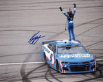 Capture the excitement of NASCAR with this autographed 2021 Kyle Larson #5 Hendrick Motorsports Las Vegas Win photo. Measuring 8x10 inches, this glossy image features Larson's signature and comes with a Certificate of Authenticity, making it a must-have for collectors.