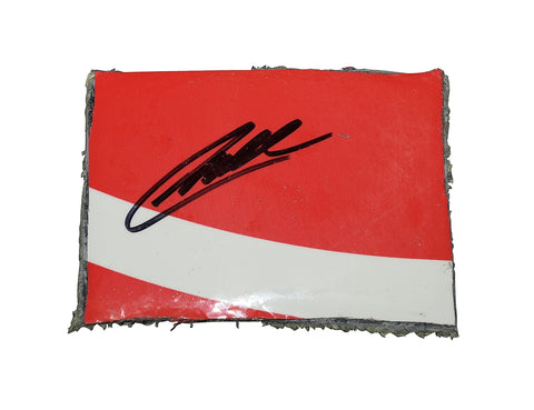 The 2022 Christopher Bell #20 Rheem Racing race-used sheet metal in red, signed by Bell, from Las Vegas Speedway. This rare NASCAR collectible comes with a COA and is perfect for display in a protective toploader.
