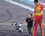 2022 Joey Logano NASCAR Champion Father & Son moment captured in an 8x10 glossy photo with authentic signature. This autographed photo comes with a Certificate of Authenticity (COA) and a lifetime guarantee, making it an unforgettable gift for racing fans.
