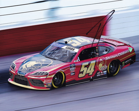 This autographed 8x10 photo features Ty Gibbs' #54 Shriners Children’s Racing car at the 2022 Darlington Throwback event. A unique NASCAR collectible with a COA and lifetime authenticity guarantee.