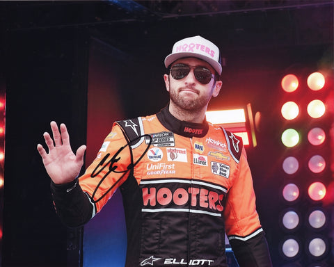 Celebrate NASCAR excitement with this signed 8x10 inch glossy photo of Chase Elliott from the 2023 Hooters Racing season. Showcasing Elliott's readiness to race, this collectible piece is perfect for display and comes with a lifetime guarantee on authenticity.