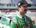 This autographed 2023 Daniel Suarez #99 Quaker State Racing Darlington Throwback Weekend photo captures the essence of NASCAR tradition. A great collectible for fans.