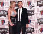 This stunning autographed photo features Kyle Larson at the 2023 NASCAR Awards Red Carpet in Nashville. The 8x10 inch glossy image showcases his #5 Hendrick Motorsports pride, perfect for any fan or collector looking to commemorate his achievements.