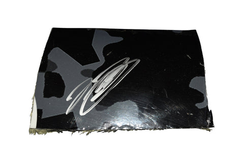 Own a piece of the 2023 NASCAR Playoffs with this signed Martin Truex Jr. #19 race-used sheet metal. Taken from his Bristol Camo Car, this authentic 3-color JGR section is securely encased in a protective toploader. A standout NASCAR collectible and a great gift for racing enthusiasts.