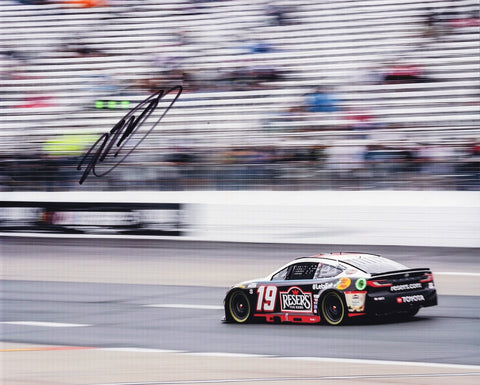 Stunning 8x10 glossy photo of Martin Truex Jr. in his #19 Reser's Racing car at the 2023 New Hampshire race. Signed by Truex Jr., this photo includes a Certificate of Authenticity (COA) and a lifetime guarantee on authenticity.
