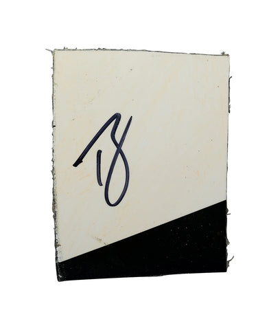 This 2023 Ty Gibbs autographed race-used sheet metal features a bold 2-color design from his Interstate Batteries car at the Charlotte Roval. Encased in a toploader, this JGR piece is a rare collectible and a fantastic gift for any motorsports enthusiast.