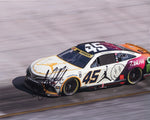 Autographed 8x10 glossy photo of Tyler Reddick driving the #45 Air Jordan Racing J Balvin car at the 2023 Bristol race. Signed by Reddick, it includes a Certificate of Authenticity (COA), perfect for NASCAR collectors.