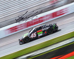 This autographed 8x10 glossy photo features Tyler Reddick's #45 DraftKings Racing car during the 2023 New Hampshire race, The Magic Mile. Signed by Reddick, it includes a COA, making it an excellent gift for NASCAR enthusiasts and collectors.