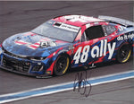 This signed 9x11 glossy photo shows Alex Bowman’s #48 Ally Racing car in the 2024 Coca-Cola 600, featuring the patriotic paint scheme. It includes a COA for authenticity, making it an ideal collectible or gift for NASCAR fans.