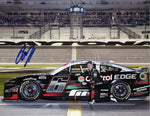 Signed 2024 Brad Keselowski #6 Daytona 500 race photo, showing Keselowski in an action-packed pit road pose during the Daytona 500. This 9x11 glossy photo comes with a COA for authenticity, making it a must-have addition to any NASCAR memorabilia collection.