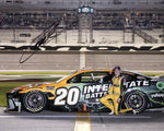 A signed 8x10 photo of Christopher Bell driving the #20 DeWalt - Interstate Batteries car at the Daytona 500. This iconic image is a must-have for NASCAR enthusiasts and makes an excellent gift.