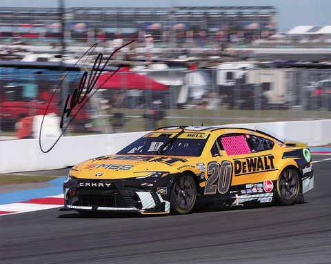 Featuring Christopher Bell's #20 DeWalt Racing car at the Charlotte Roval, this signed 8x10-inch photo captures the unique pink window net. This collectible piece includes a Certificate of Authenticity and makes a great gift.