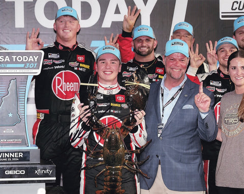 This autographed 8x10 glossy photo of Christopher Bell’s 2024 New Hampshire win with lobster in Victory Lane is a must-have for NASCAR fans. Comes with a COA for authenticity.