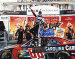 Glossy 8x10 photo of Connor Zilisch celebrating his 2024 Watkins Glen win in the #88 Carolina Carports Xfinity Series car, autographed with COA. Ideal for NASCAR collectors and fans seeking unique memorabilia.