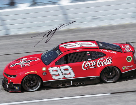 Autographed 2024 Daniel Suarez #99 Coca-Cola Racing Darlington Throwback Car photo in glossy 9x11 inch format. A tribute to Darlington Raceway with Suarez’s signature and Certificate of Authenticity, perfect for any NASCAR collection.