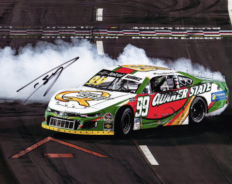 This autographed 2024 Daniel Suarez #99 Quaker State Racing Los Angeles Win photo captures the excitement of Suarez’s victory burnout. Signed by Suarez, it’s a special collectible for NASCAR fans, complete with a Certificate of Authenticity to ensure its value.