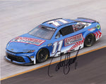 This autographed 2024 Denny Hamlin #11 Express Oil Change photo from Bristol Motor Speedway captures Hamlin racing for Joe Gibbs Racing. A must-have collectible, it includes a Certificate of Authenticity, perfect for NASCAR fans.