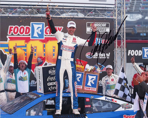 Own a piece of NASCAR history with this autographed Denny Hamlin Victory Lane photo from his 2024 Bristol Win. This glossy 8x10 print features a lifetime guarantee on authenticity and makes a perfect gift for devoted NASCAR fans or anyone who appreciates racing memorabilia.