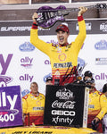 Autographed 8x10 glossy photo of Joey Logano celebrating in Victory Lane after his 2024 Nashville NASCAR win. Featuring his signature and Certificate of Authenticity, this photo is a great addition to any NASCAR fan’s collection.