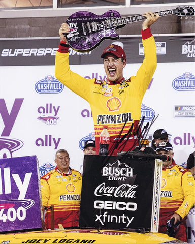 Autographed 8x10 glossy photo of Joey Logano celebrating in Victory Lane after his 2024 Nashville NASCAR win. Featuring his signature and Certificate of Authenticity, this photo is a great addition to any NASCAR fan’s collection.