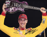 Autographed 8x10 glossy photo of Joey Logano celebrating in Victory Lane with the iconic guitar after his 2024 Nashville NASCAR win. The photo includes his signature and a Certificate of Authenticity, making it an amazing collectible for NASCAR fans.