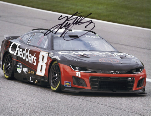 This autographed 2024 Kyle Busch #8 Cheddars Camaro Kansas Speedway photo features Busch in action during a thrilling race moment. Signed by the NASCAR legend, the 9x11 inch glossy photo comes with a Certificate of Authenticity (COA). It’s a must-have for NASCAR collectors and racing fans.