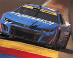 2024 Kyle Larson #5 Watkins Glen race photo, autographed by Larson. This signed 8x10 NASCAR glossy photo showcases Larson navigating the famous road course, with COA for guaranteed authenticity. Perfect for any NASCAR fan!