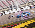 Own a piece of NASCAR history with this autographed 8x10 inch glossy photo of Kyle Larson’s finish line victory in Las Vegas. This signed collectible, complete with a Certificate of Authenticity, ensures you have a genuine piece of racing memorabilia.