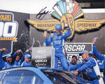 This autographed 8x10 inch NASCAR photo captures Kyle Larson in Victory Lane after his 2024 Brickyard 400 win. Featuring his Hendrick Motorsports #5 car, the photo is signed and comes with a Certificate of Authenticity, perfect for collectors.