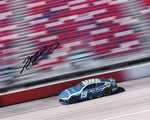 This autographed 2024 Martin Truex Jr. #19 Auto-Owners Racing photo from the Darlington Throwback Race captures a historic moment in Truex’s final season. Signed by the driver himself, it comes with a COA to ensure authenticity, making it a valuable NASCAR collectible.