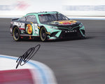 This autographed 2024 Martin Truex Jr. #19 Bass Pro Shops Charlotte Roval Race photo celebrates the 50th Anniversary of the event. Signed by Truex, this 8x10 glossy photo is a must-have collectible for NASCAR fans, with a COA ensuring authenticity.