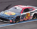 Autographed 8x10 glossy photo of Martin Truex Jr. competing in the 2024 Coca-Cola 600 during his final season with the #19 Bass Pro Shops team. Includes his signature and a Certificate of Authenticity (COA).