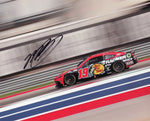 Celebrate Martin Truex Jr.'s final season with this signed 2024 #19 Bass Pro Shops Patriotic COTA Race photo. This 8x10 glossy photo, signed by Truex, comes with a COA and is an ideal gift for any NASCAR fan or collector.