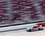 This autographed 2024 Martin Truex Jr. #19 Bass Pro Shops Patriotic Darlington Southern 500 photo captures Truex on the legendary track. The 8x10 glossy photo, signed by Truex, comes with a COA and is a unique NASCAR collectible.
