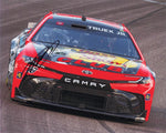 Autographed 8x10 glossy photo of Martin Truex Jr. at Phoenix Raceway in his final season with Bass Pro Shops Racing. Signed by Truex and includes a Certificate of Authenticity (COA), a must-have for NASCAR fans.