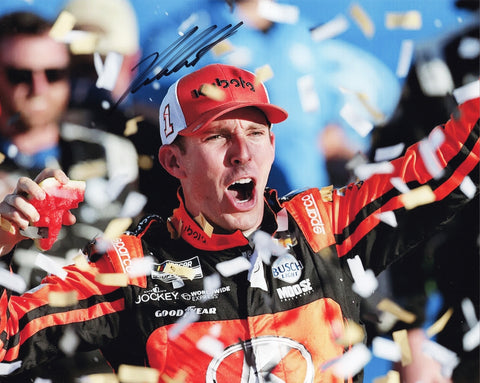 Autographed 2024 Ross Chastain #1 Kubota Racing Kansas Playoff Win 8x10 photo, capturing the Victory Lane confetti celebration. Signed by Chastain and authenticated with a Certificate of Authenticity (COA), ideal for NASCAR collectors.