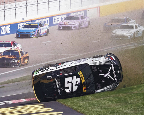 Authentic 2024 Tyler Reddick #45 Jordan Brand Black Las Vegas crash photo, signed by Tyler Reddick with Certificate of Authenticity (COA) for verified value.