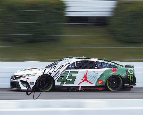 Authentic signed 8x10 photo of Tyler Reddick racing the #45 Jordan Brand H Wings Car for 23XI Racing in 2024. Includes Reddick’s signature and a Certificate of Authenticity (COA), a great addition for NASCAR memorabilia collectors.